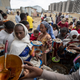 Displaced Tigrayans queue to receive food donated by local residents at a reception center for the internally displaced in Mekele, in the Tigray region of northern Ethiopia on May 9, 2021. The Ethiopian government on Thursday, March 24, 2022 announced what it called an “indefinite humanitarian truce” in its war-ravaged Tigray region, saying the action was necessary to allow unimpeded relief supplies into the area.
